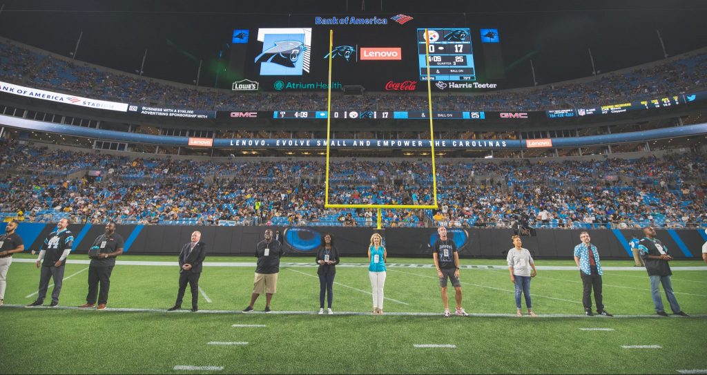 Evolve Small finalists lined up on the field at halftime.