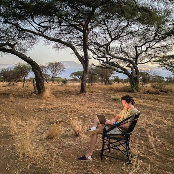 Sylvain in Africa with a Lenovo laptop